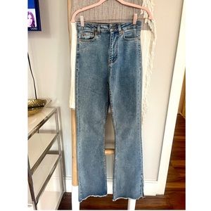 NEVER WORN - MOTEL ROCKS - SPLIT BOOTLEG JEANS IN LIGHT WASH - Size: 32 xxs 32L